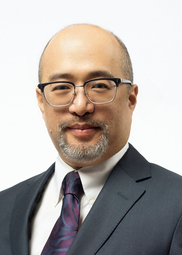 headshot of team member George P. Huang